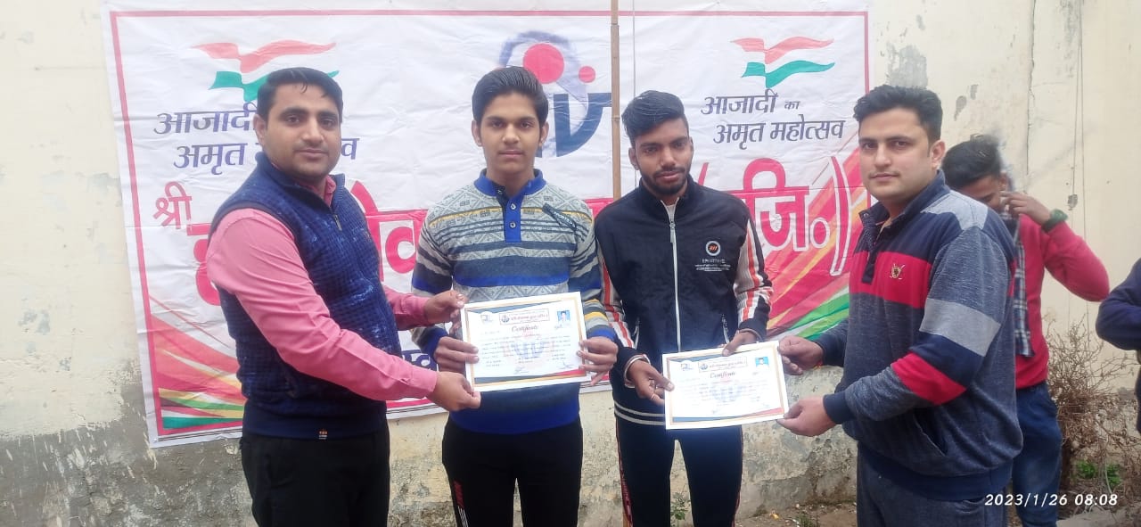 Students of the trust receiving their computer training certificates
